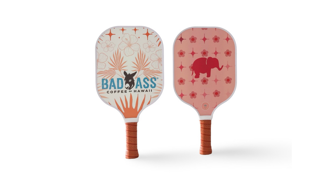 Two custom pickleball paddles