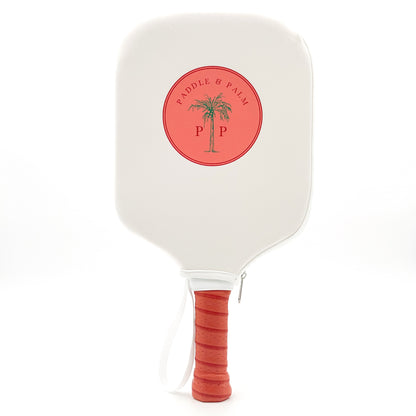 A cute pickleball paddle with a paddle cover