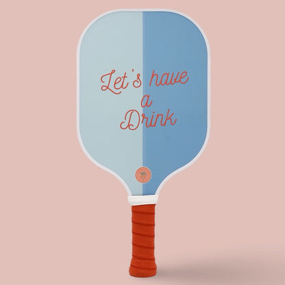 The back of a cute pickleball paddle with a blue and red design