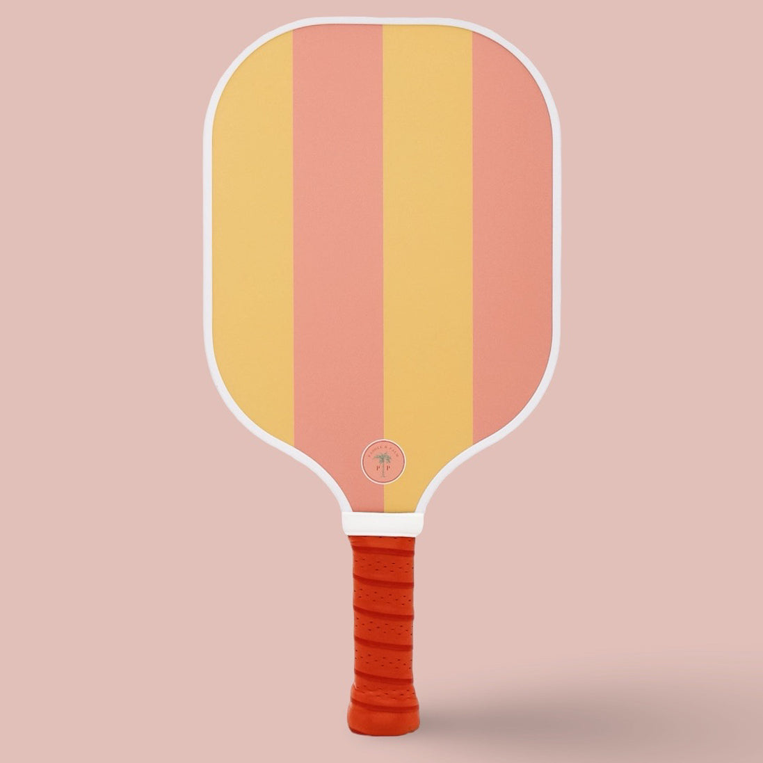 The back of a cute pickleball paddle with yellow and coral stripes