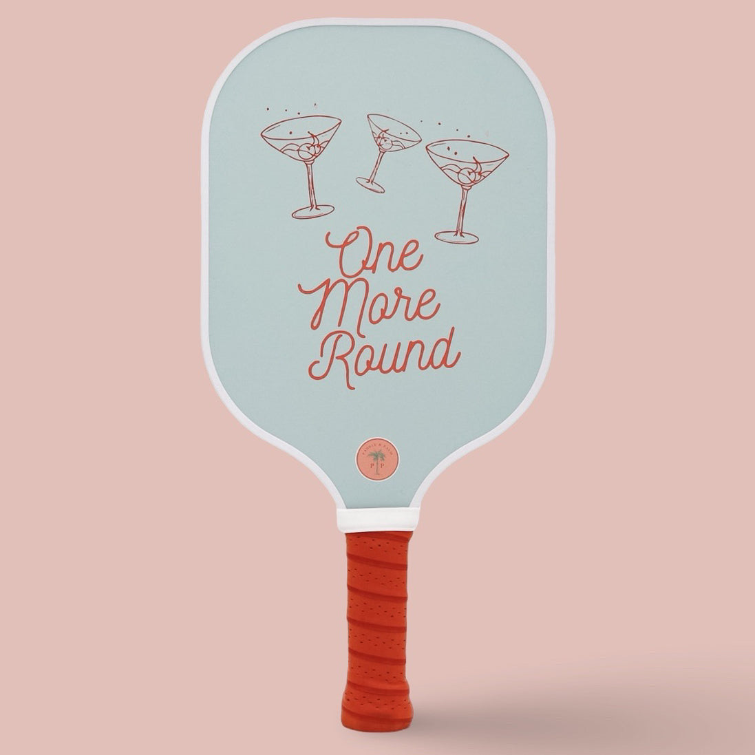 The front of a cute pickleball paddle with a blue and red design