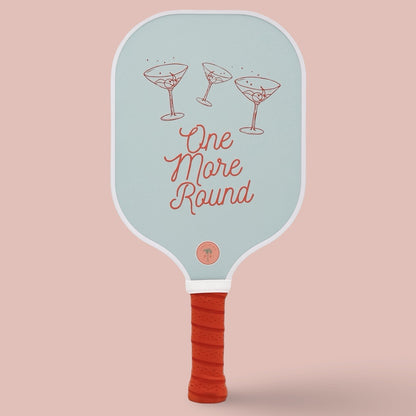 The front of a cute pickleball paddle with a blue and red design